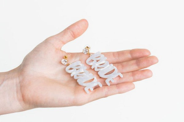 Gold bride earrings with hand-lettered calligraphy and zircon studs