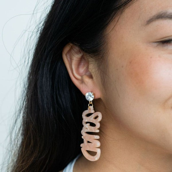 Bachelorette squad earrings on model showing elegant design