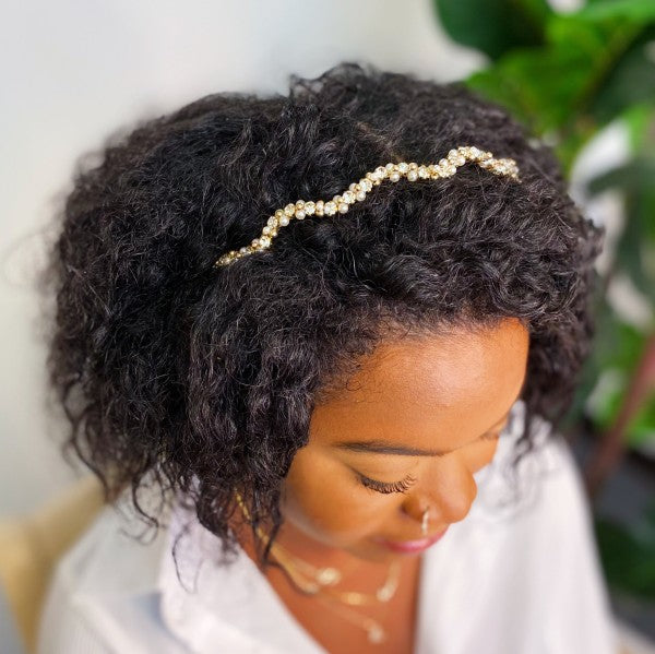 Crystal and pearl headband on model for wedding