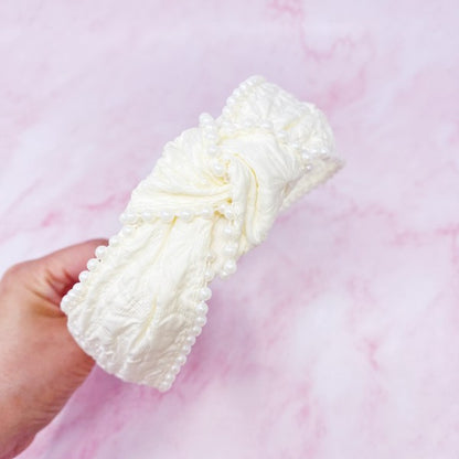 White elegant knot pearl embellished headband for weddings