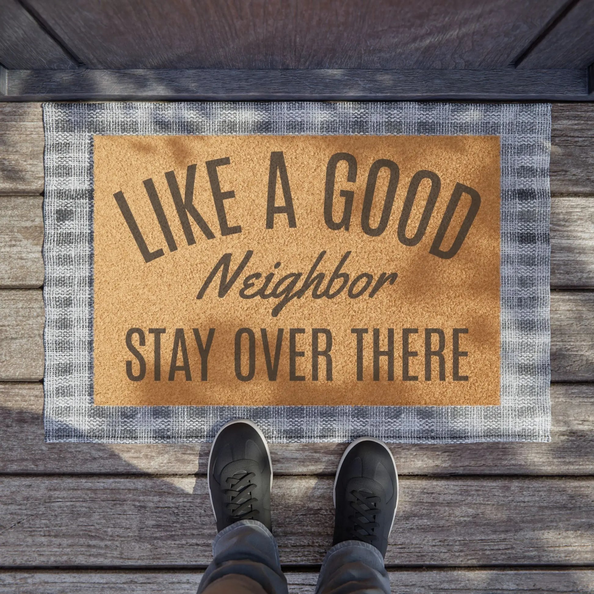 "Like a Good Neighbor, Stay Over There" Funny Outdoor Doormat image 0