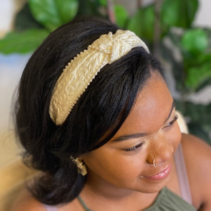 Side view of elegant pearl embellished wedding headband