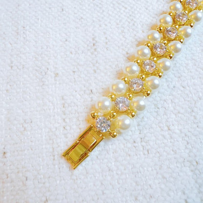 Close-up of pearl and sparkle bracelet showing 18k gold plating